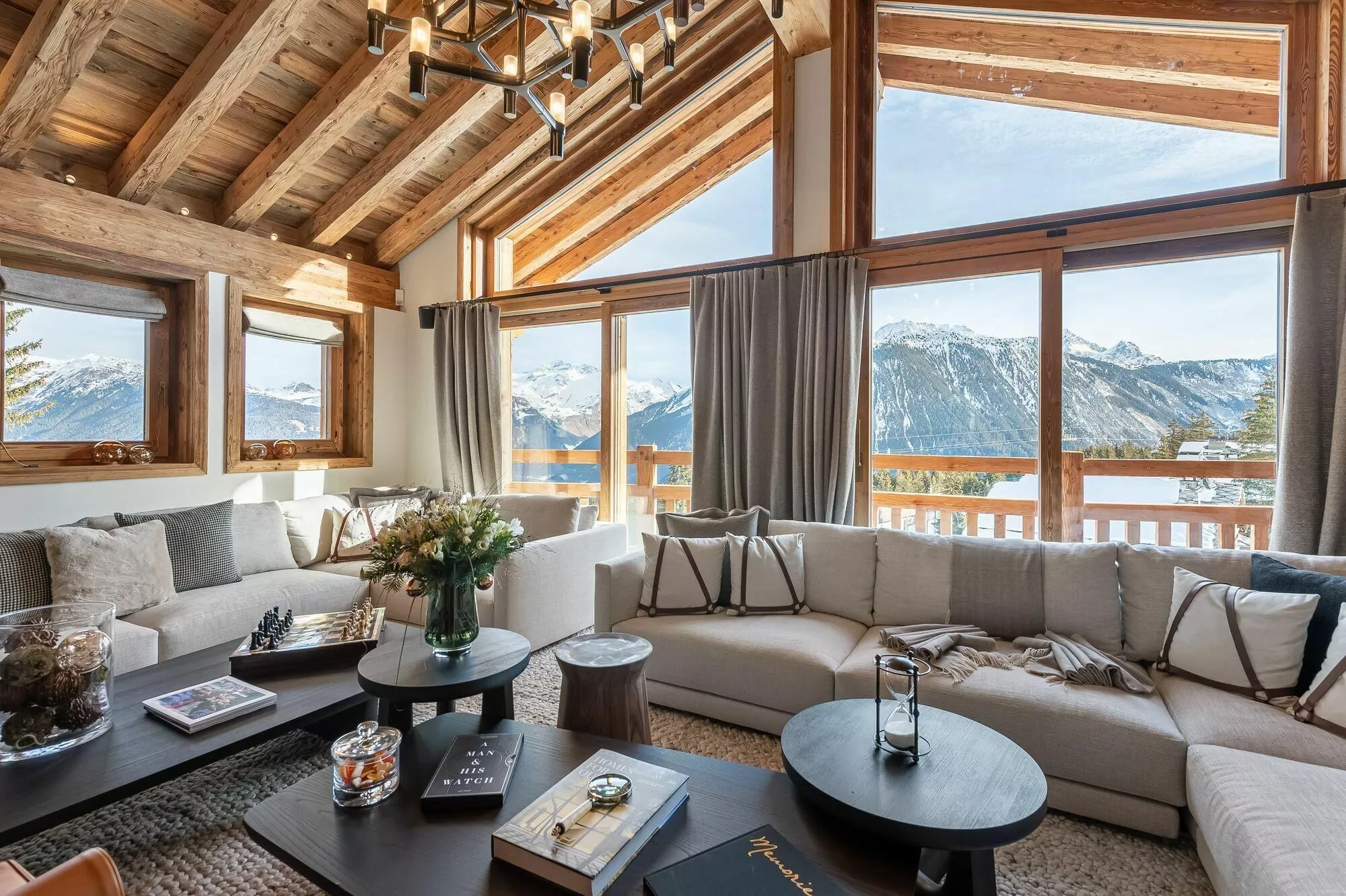 Alpine living room with panoramic mountain views at Chalet Les Bruxellois