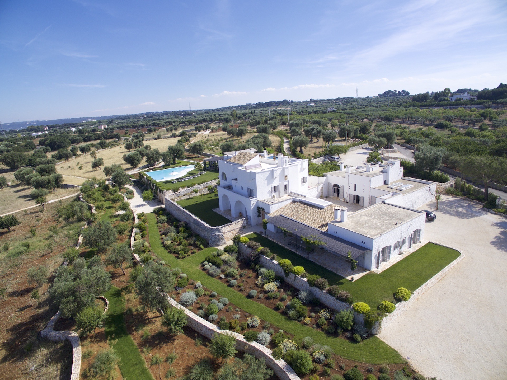 Masseria Petrarolo farmhouse, gardens and pool viewed from above